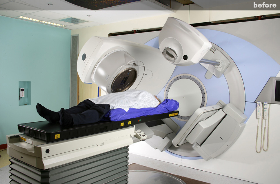 Elekta Oncology equipment before retouching with untidy floor and background