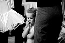 A girl waits for her dance performance to start, black and white image