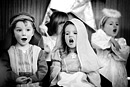 Children sing in their nursery nativity play, black and white image