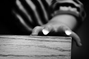 A close up of a child’s hand, black and white image