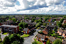 A tilt shift view of residential housing from a block of flats