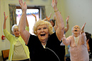 Residents of an old peoples home take part in an exercise class