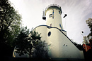 A man abseils down Kenilworth water tower.