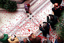 A remembrance day service, poppy leaves dropped by war veterans, taken from above