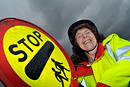 Portrait of a lollipop lady with her lollipop