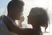 Will & Raquel on the beach on their wedding day