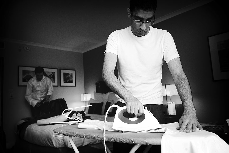 Best man ironing his shirt