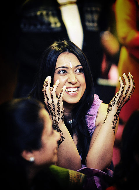 The bride watching a dance in her honour