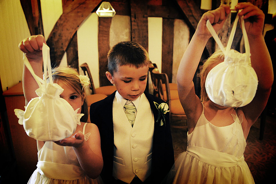 Bridesmaids showing off hand made bags