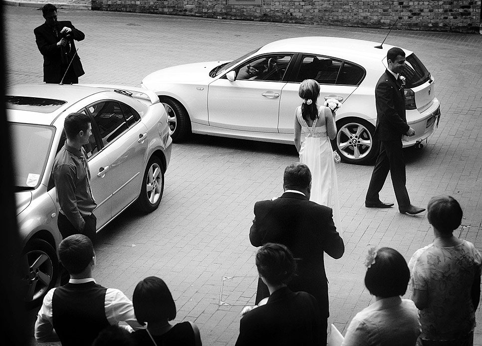 The bride and groom leave for the reception